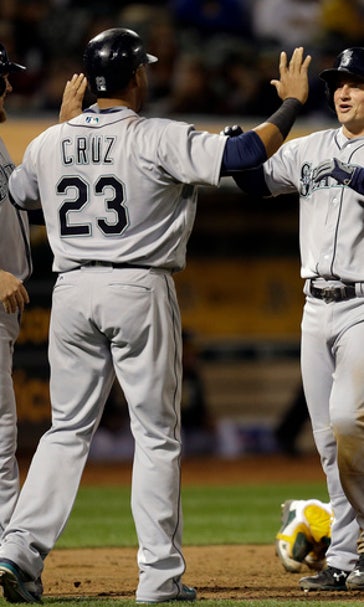 Mariners hit 3 home runs to power past the Athleti